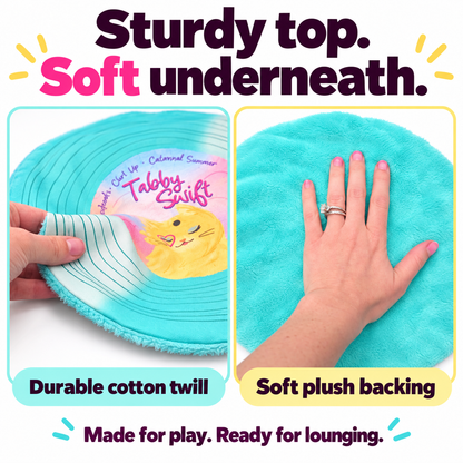 A turquoise round lounge mat shown in a split comparison graphic. The left panel shows a hand peeling back a striped cotton twill layer to reveal the inner structure, with the text 'Durable cotton twill.