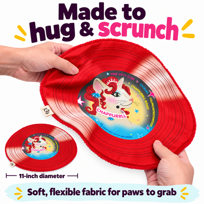 Hands bending the flexible red Chappurrll Roan catnip record mat, with an inset showing its 11-inch diameter.