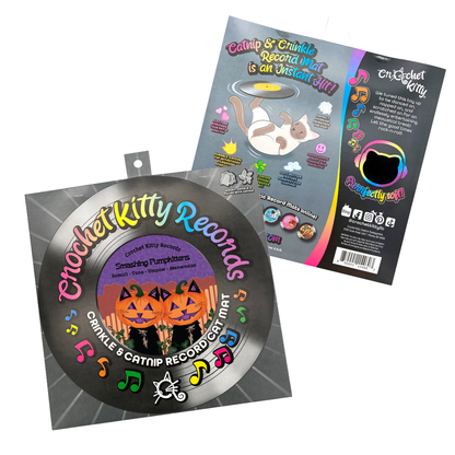 Front and back of Smashing Pumpkittens catnip record mat packaging, featuring orange pumpkin cats and rainbow lettering.