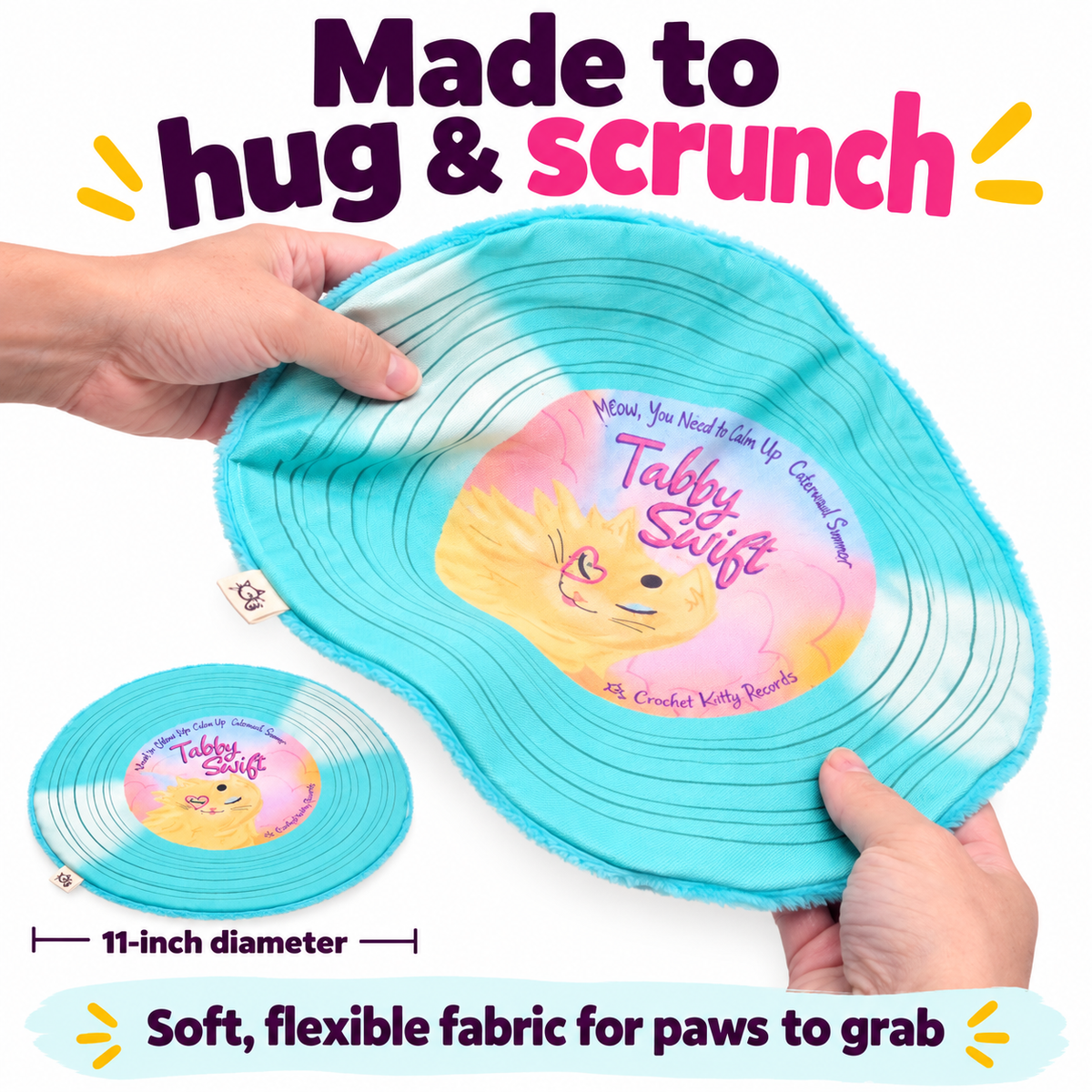 Hands bending an 11-inch Tabby Swift Record Cat Mat to show its flexible fabric