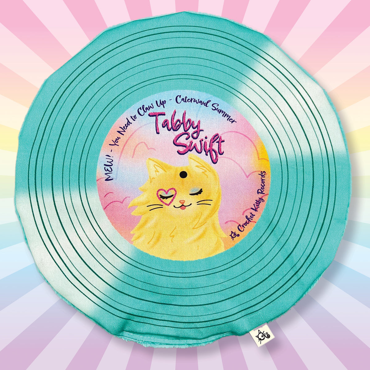 Tabby Swift teal record with rainbow rays be hide it showing off the record cat mat.