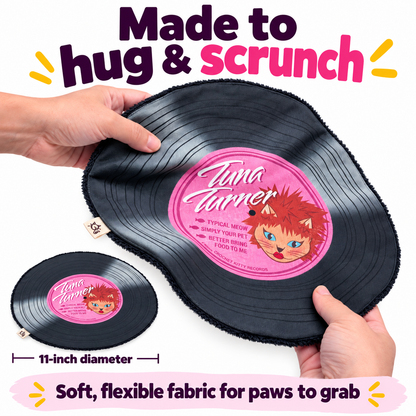 Hands bending the flexible Tuna Turner catnip record mat, with an inset showing its 11-inch diameter.