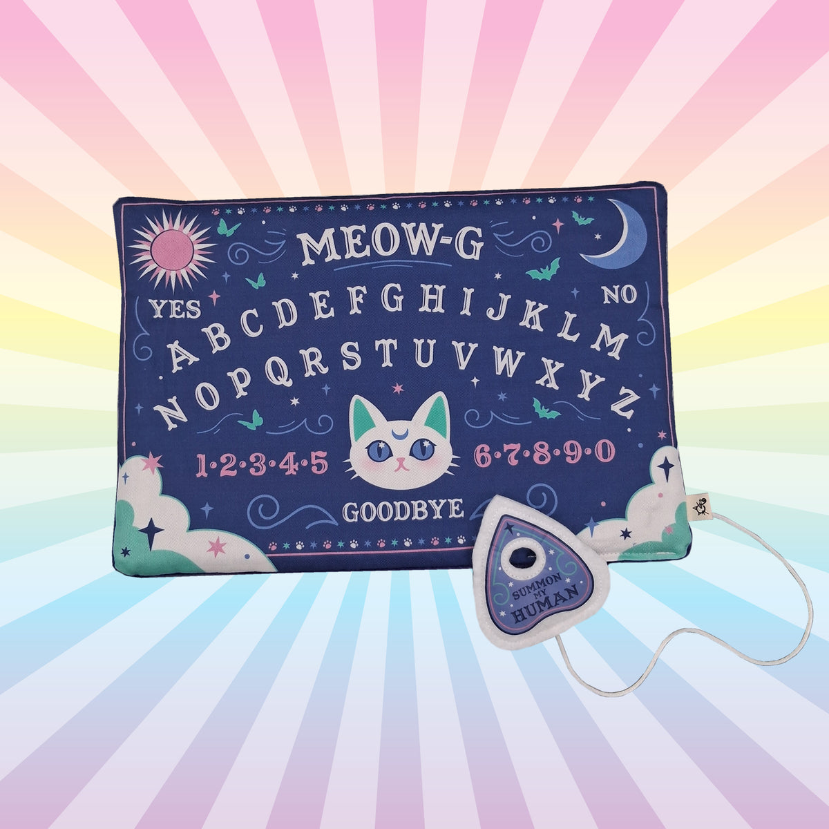 Spirit board with cat design and alphabet cat mat on a colorful background